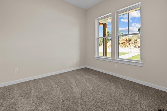 16509 Crossing Cir, Lindale, TX 75771 - unfurnished room featuring baseboards and carpet floors