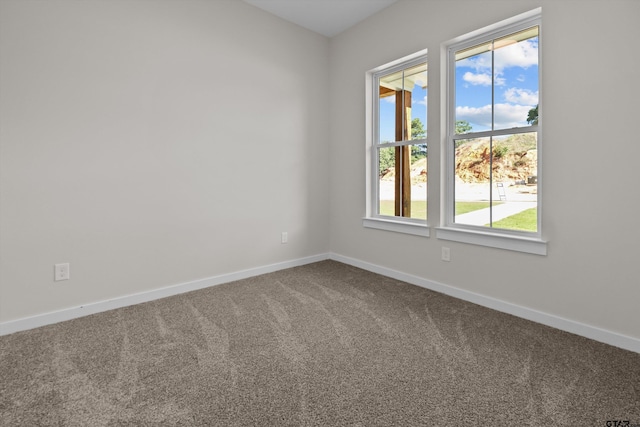 16509 Crossing Cir, Lindale, TX 75771 - unfurnished room with baseboards and carpet