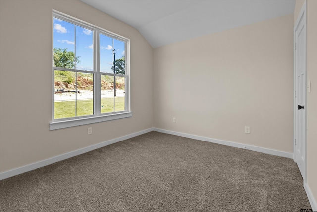16509 Crossing Cir, Lindale, TX 75771 - carpeted empty room featuring vaulted ceiling and baseboards