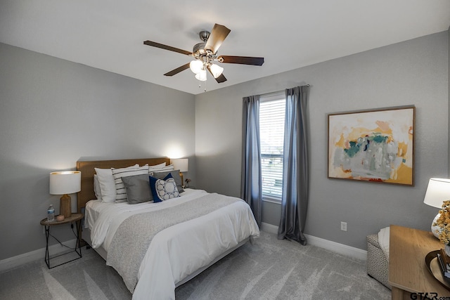 7317 Hearthstone Ln, Tyler, TX 75703 - carpeted bedroom featuring baseboards and a ceiling fan