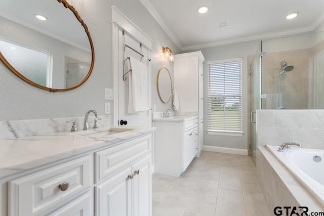 15988 C R 1151, Tyler, TX 75704 - bathroom with a shower stall, two vanities, a bath, ornamental molding, and tile patterned floors