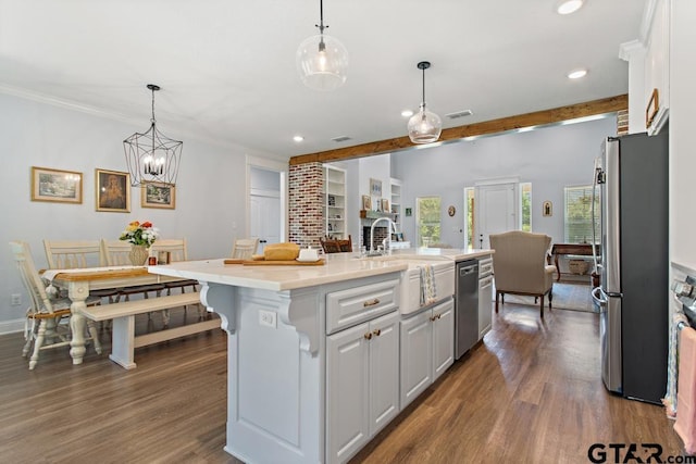 15988 C R 1151, Tyler, TX 75704 - kitchen featuring stainless steel appliances, white cabinets, recessed lighting, dark wood-style floors, and light countertops