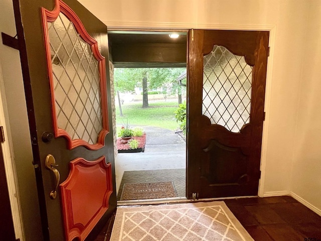 609 Francis St, Hawkins, TX 75765 - entryway featuring baseboards and tile patterned flooring
