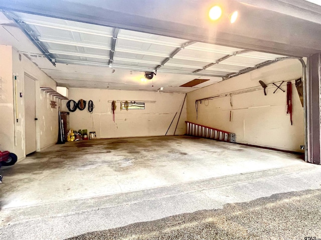 609 Francis St, Hawkins, TX 75765 - garage featuring a garage door opener
