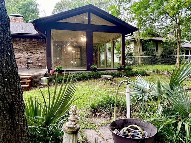 609 Francis St, Hawkins, TX 75765 - view of yard featuring a sunroom