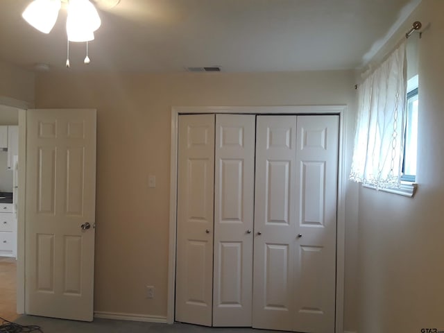 unfurnished bedroom with a closet