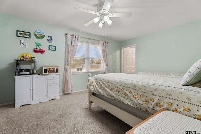 bedroom with ceiling fan and light carpet