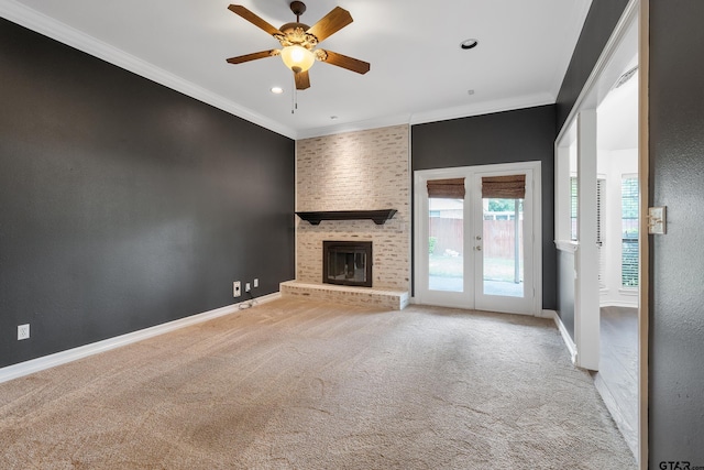 3110 Oleander Dr, Tyler, TX 75707 - unfurnished living room with a fireplace, ceiling fan, french doors, and carpet flooring