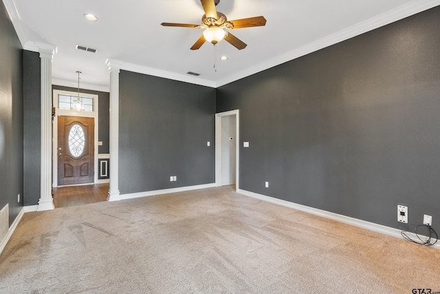 3110 Oleander Dr, Tyler, TX 75707 - carpeted empty room featuring visible vents, ceiling fan, baseboards, and decorative columns
