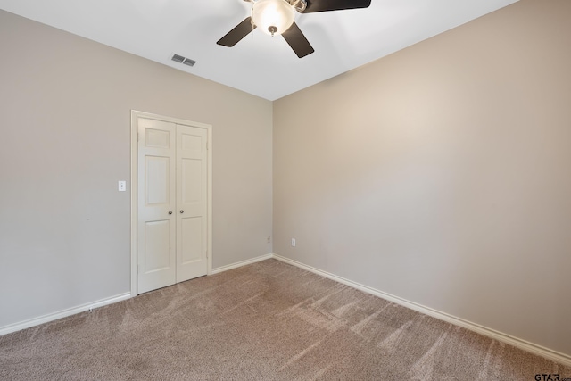 3110 Oleander Dr, Tyler, TX 75707 - carpeted spare room with baseboards, visible vents, and ceiling fan