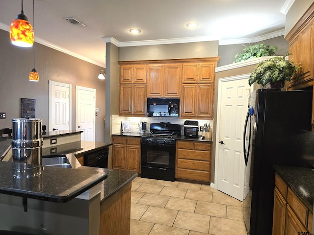 kitchen featuring ornamental molding, black appliances, light tile patterned floors, and decorative light fixtures