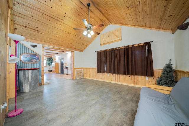 living room with wooden ceiling, high vaulted ceiling, wooden walls, ceiling fan, and beam ceiling