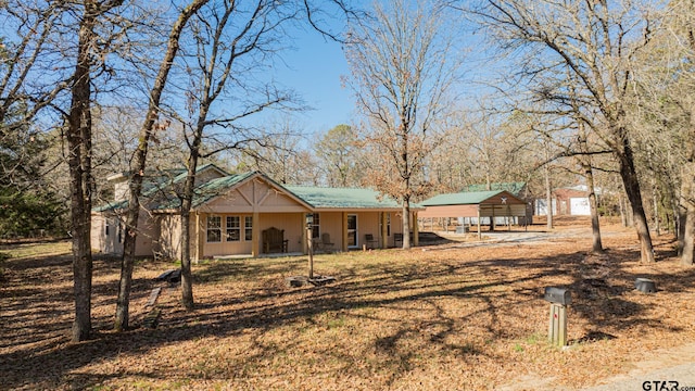 exterior space featuring a carport