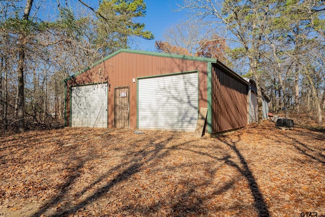 view of outdoor structure featuring a garage