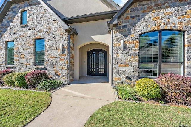 entrance to property featuring french doors