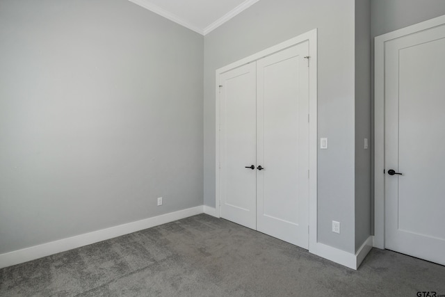 unfurnished bedroom featuring crown molding and light carpet