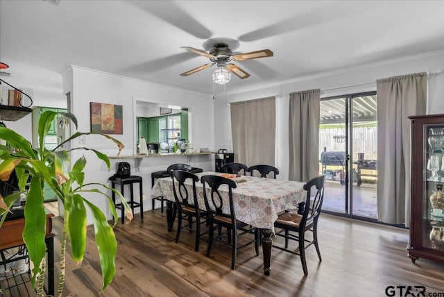 2631 Amy Ln, Tyler, TX 75701 - dining space featuring wood finished floors, ceiling fan, crown molding, and plenty of natural light