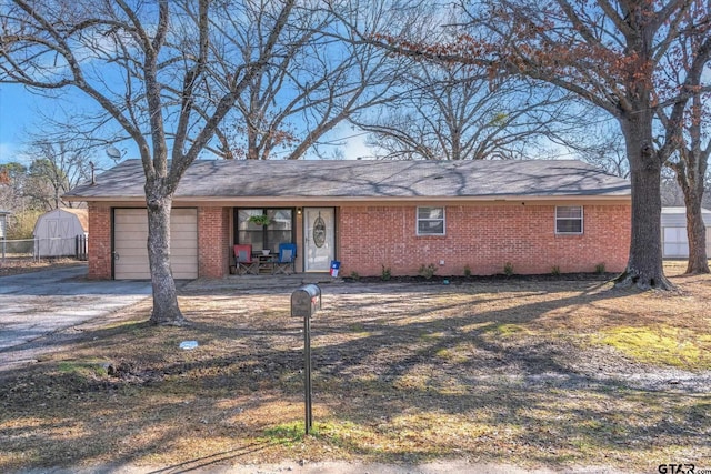 single story home featuring a garage