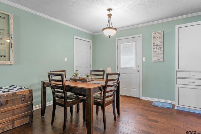 dining area with crown molding, dark hardwood / wood-style floors, and a textured ceiling