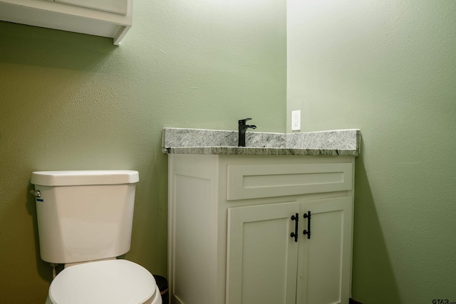 1605 County Road 4510, Winnsboro, TX 75494 - bathroom with vanity and toilet