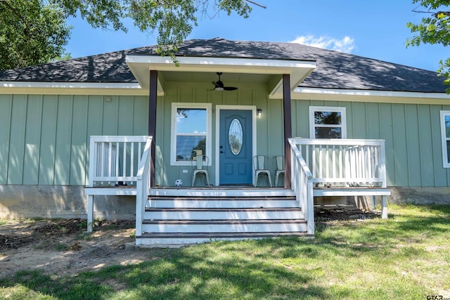 1605 County Road 4510, Winnsboro, TX 75494 - entrance to property featuring ceiling fan, roof with shingles, and a lawn