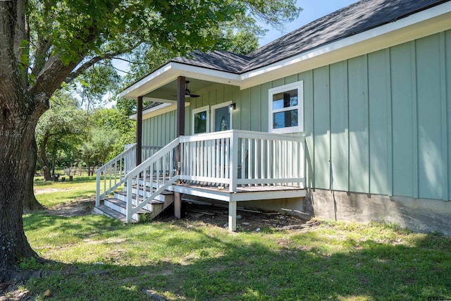 1605 County Road 4510, Winnsboro, TX 75494 - doorway to property with a lawn, roof with shingles, board and batten siding, and ceiling fan