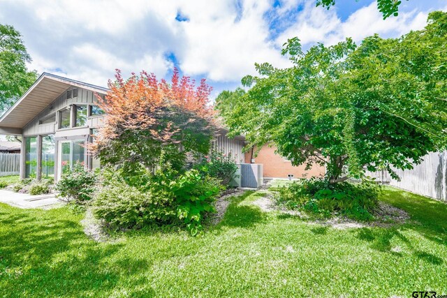 138 Drexel Dr, Sulphur Springs, TX 75482 - view of yard featuring central AC unit
