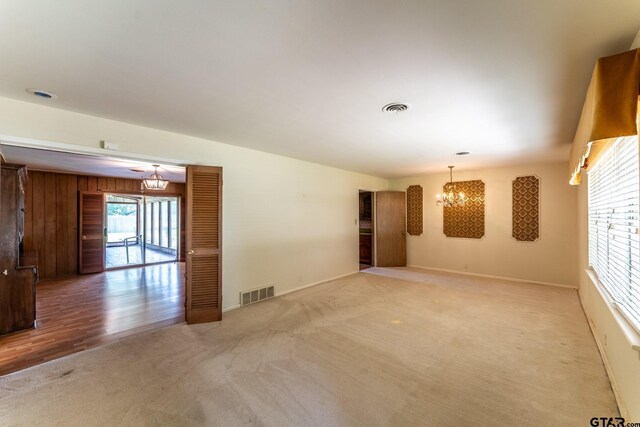 138 Drexel Dr, Sulphur Springs, TX 75482 - spare room with a chandelier, light carpet, and baseboards