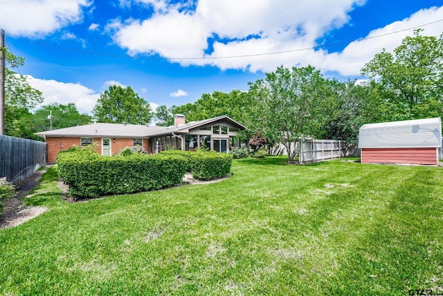 138 Drexel Dr, Sulphur Springs, TX 75482 - view of yard featuring an outdoor structure and a storage unit