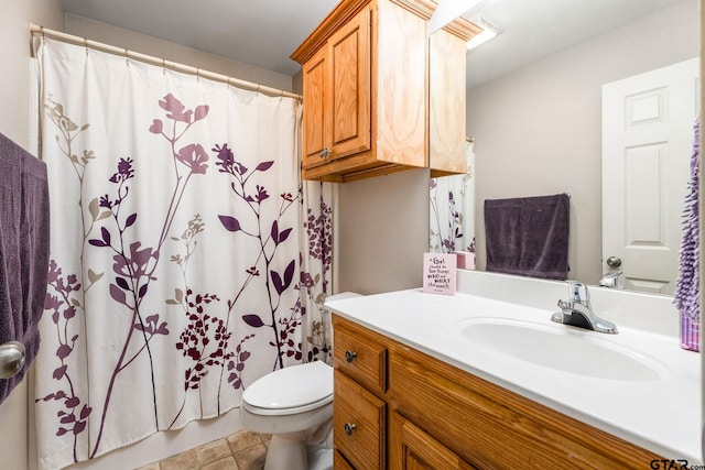 bathroom with vanity, toilet, and a shower with shower curtain