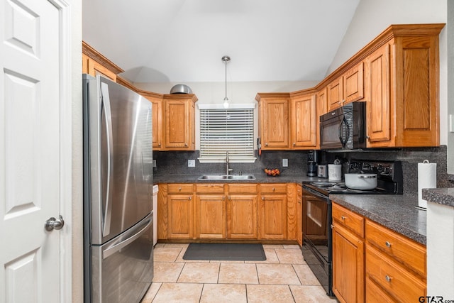 kitchen with vaulted ceiling, black appliances, sink, tasteful backsplash, and light tile patterned floors