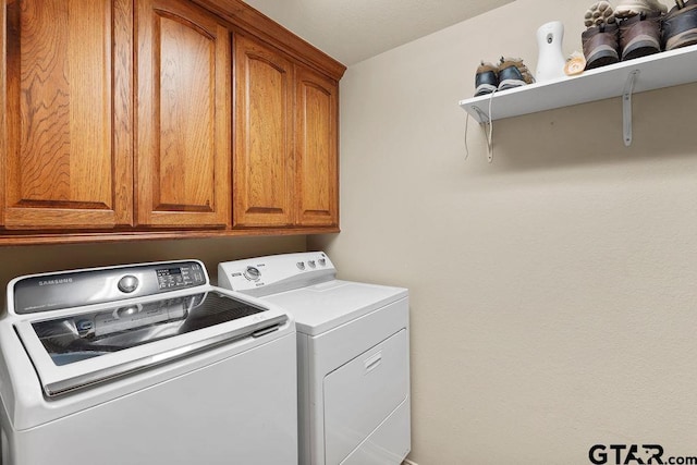 3029 Yasmeen Cir, Flint, TX 75762 - washroom featuring washing machine and clothes dryer and cabinet space