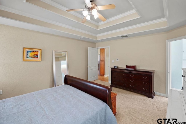 3029 Yasmeen Cir, Flint, TX 75762 - bedroom with a tray ceiling, ornamental molding, light carpet, and a ceiling fan