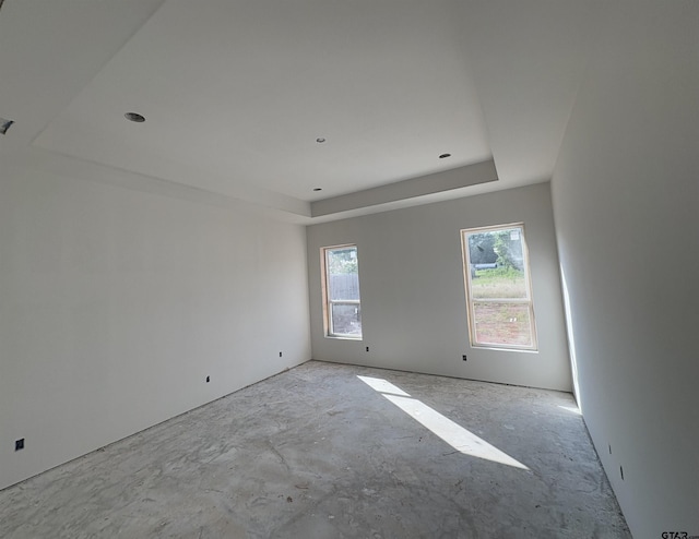 8532 Freestone Dr, Bullard, TX 75757 - spare room featuring a tray ceiling