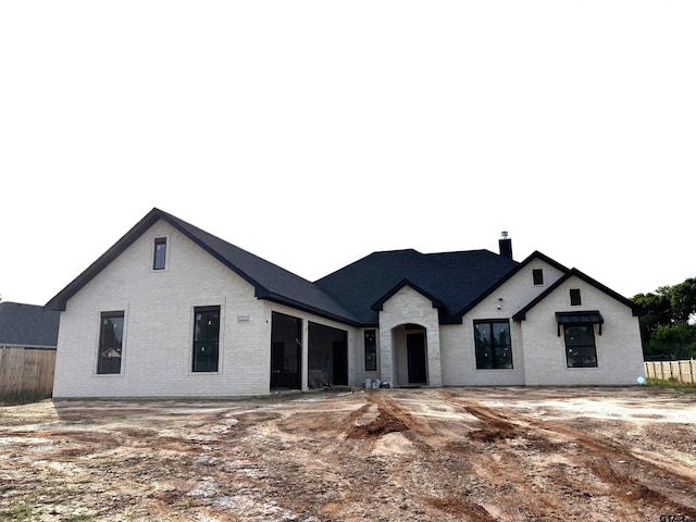 8532 Freestone Dr, Bullard, TX 75757 - view of front of house with brick siding and a chimney