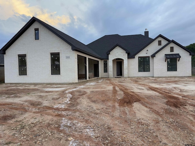 8532 Freestone Dr, Bullard, TX 75757 - view of front of property with brick siding and a chimney