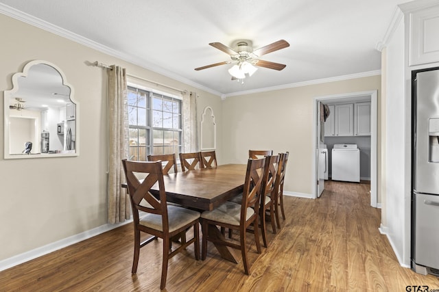 dining room with ceiling fan, wood-type flooring, independent washer and dryer, and crown molding