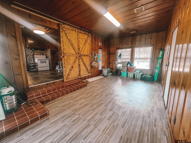 miscellaneous room featuring wood walls, wood-type flooring, and wood ceiling