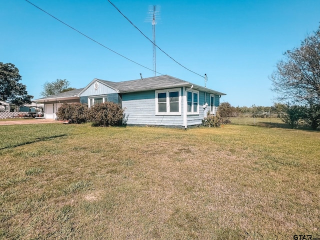 view of front of home with a front yard