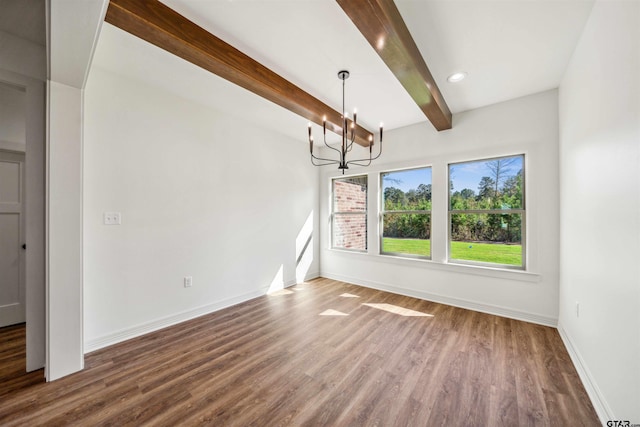 unfurnished dining area with hardwood / wood-style flooring, a notable chandelier, and beam ceiling