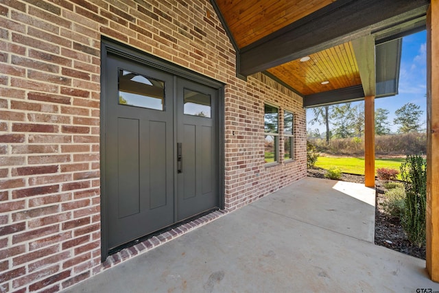 doorway to property featuring french doors