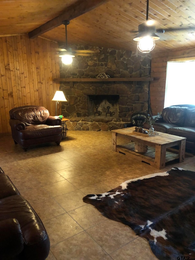 living room with a fireplace, wooden ceiling, wood walls, and lofted ceiling with beams