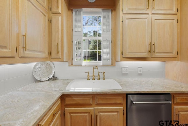 1701 Devonshire Dr, Tyler, TX 75703 - kitchen featuring light brown cabinets, dishwasher, and decorative backsplash