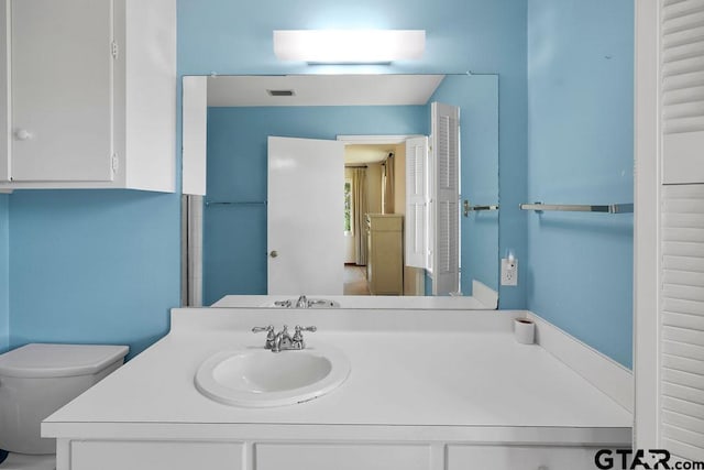 1701 Devonshire Dr, Tyler, TX 75703 - bathroom featuring toilet and vanity