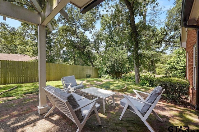 1701 Devonshire Dr, Tyler, TX 75703 - fenced backyard with a patio area