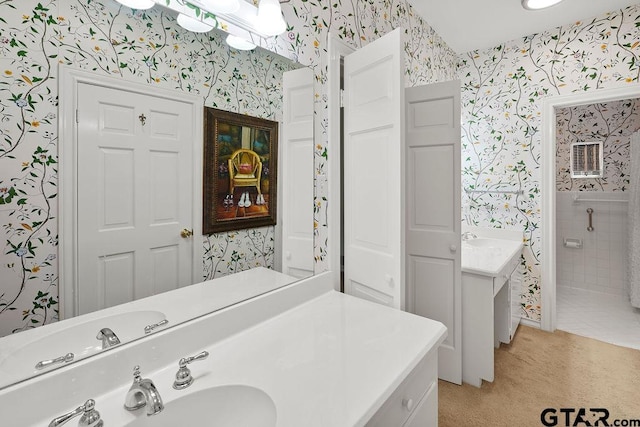 1701 Devonshire Dr, Tyler, TX 75703 - bathroom with wallpapered walls and vanity
