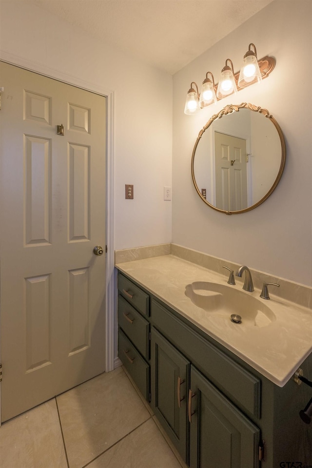 bathroom featuring tile patterned floors and vanity