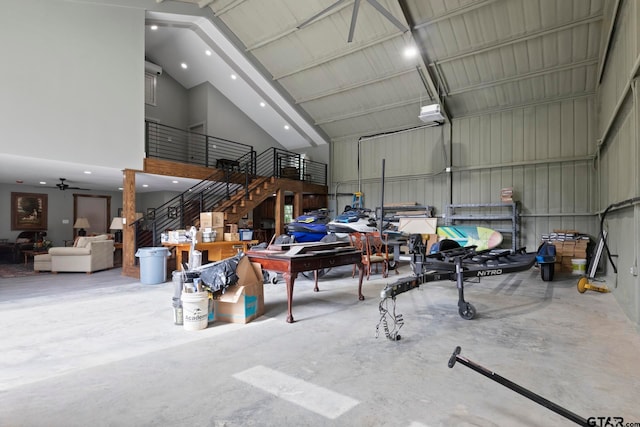 garage featuring ceiling fan and a garage door opener