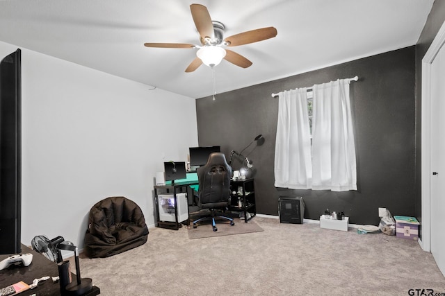 office area featuring ceiling fan and carpet