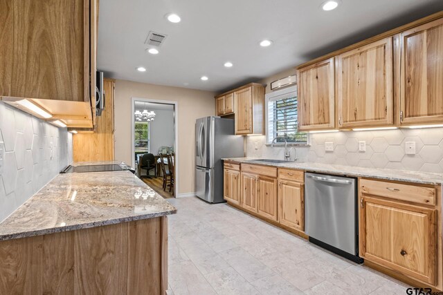 314 Cedar St, Mount Pleasant, TX 75455 - kitchen with a wealth of natural light, a sink, recessed lighting, and appliances with stainless steel finishes